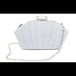 Gorgeous silver shine clutch. NEW